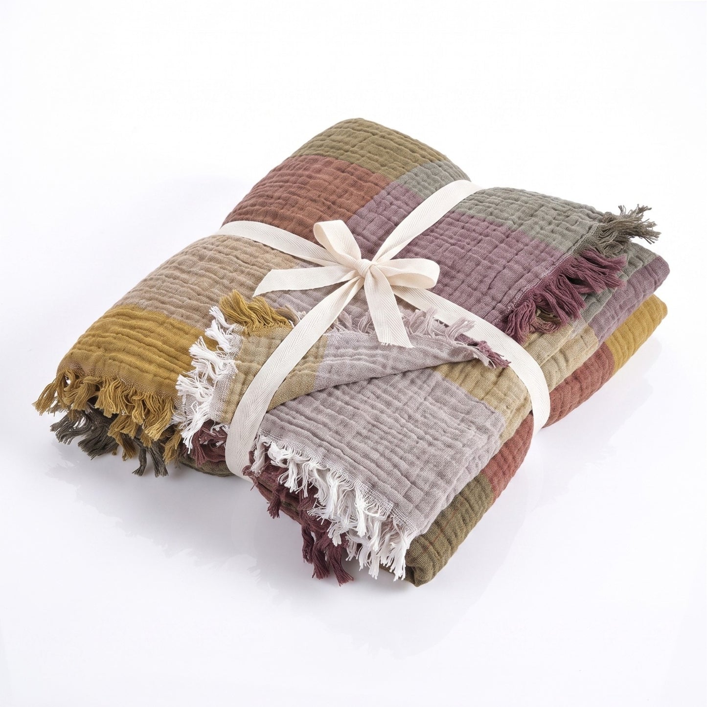 Stack of multicolored Cotton Plaid Throw Blanket – Sofa Throw & Picnic Blanket tied with a ribbon on a white background