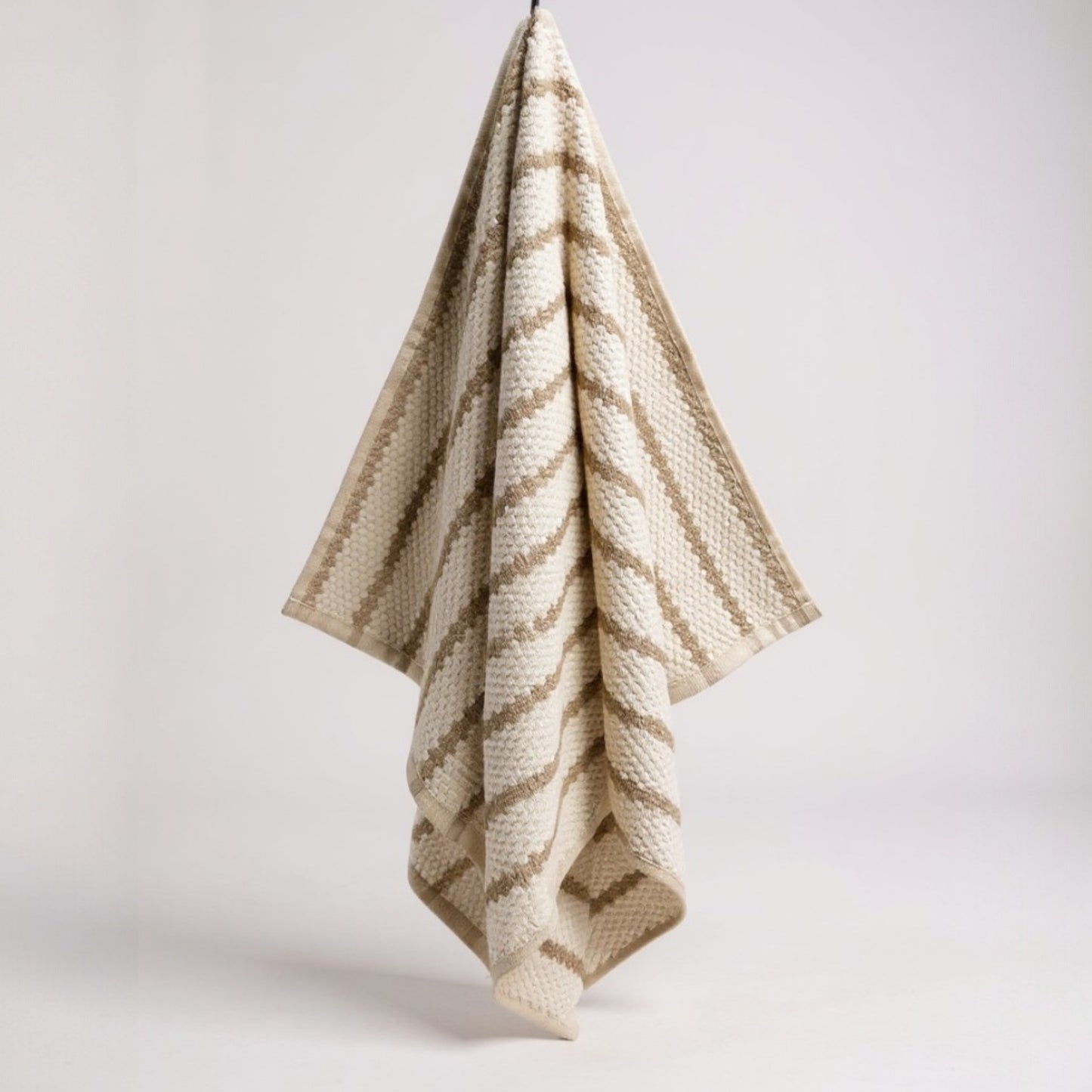 Handmade handwoven natural cotton Turkish hand towels in striped design, shown in four color variations, versatile for hand, head, guest, or kitchen use.
