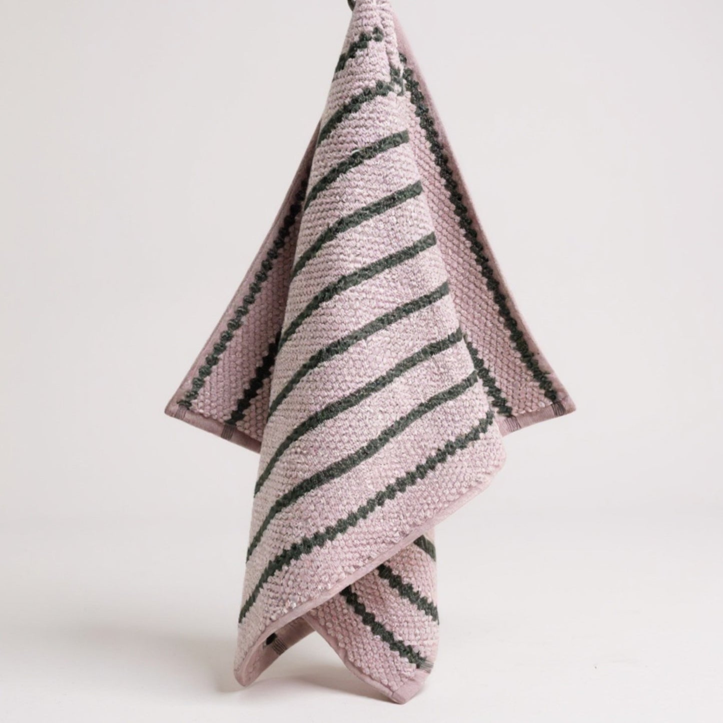 Handmade handwoven natural cotton Turkish hand towels in striped design, shown in four color variations, versatile for hand, head, guest, or kitchen use.