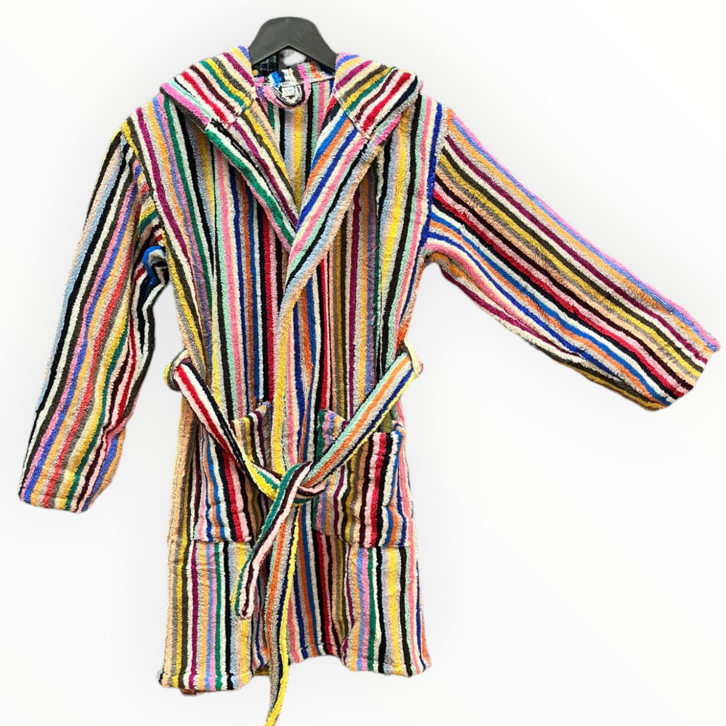 A multicolored striped kids' bathrobe made of Turkish cotton, displayed on a hanger.
