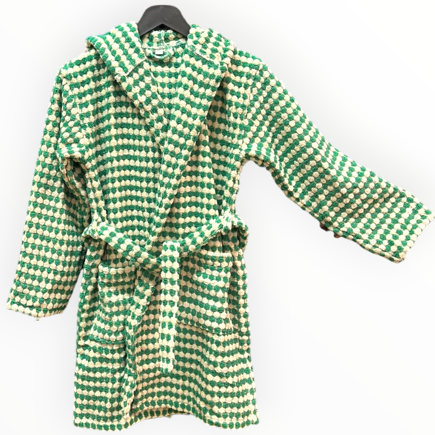 A green and white checkered kids' bathrobe with a hood, made of Turkish cotton, displayed on a hanger.