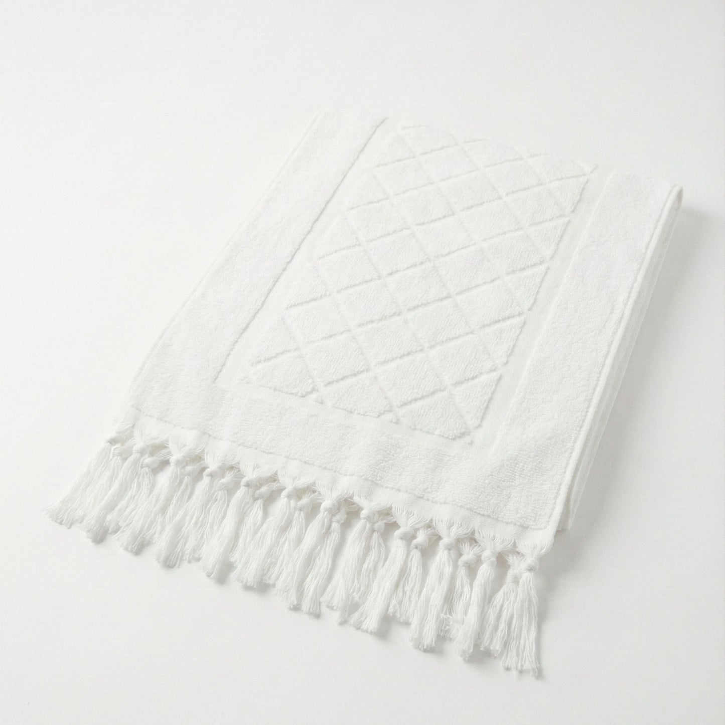 Hand-woven Baklava Design Turkish hand towel with traditional diamond pattern a light gray background