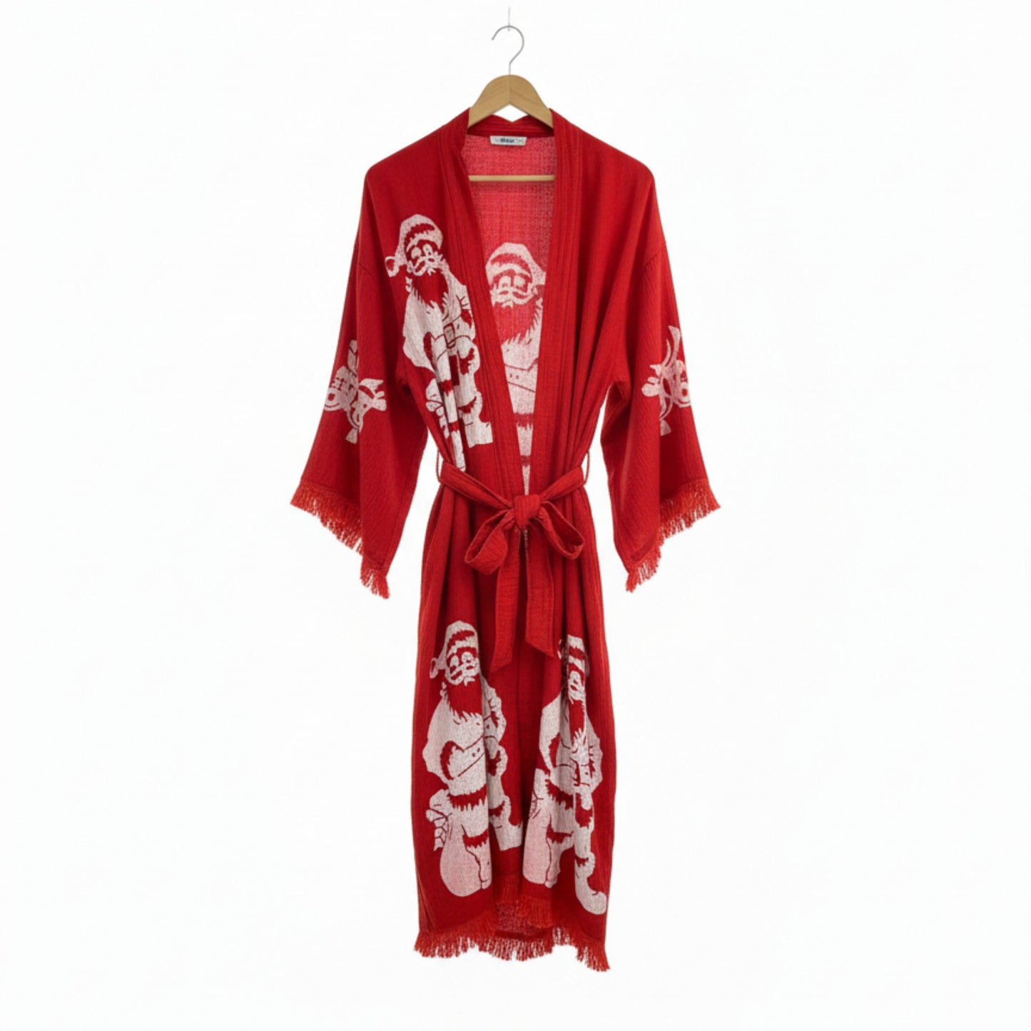 Red robe with Santa Claus pattern on a hanger against a white background