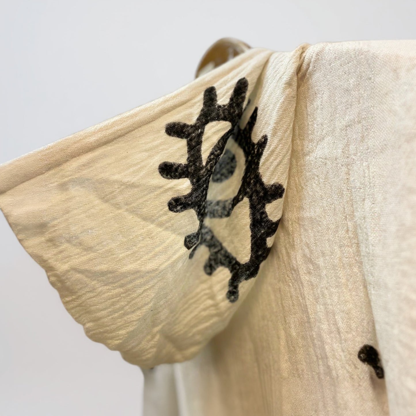 Hood of evil eye surf poncho beachponcho detailed view