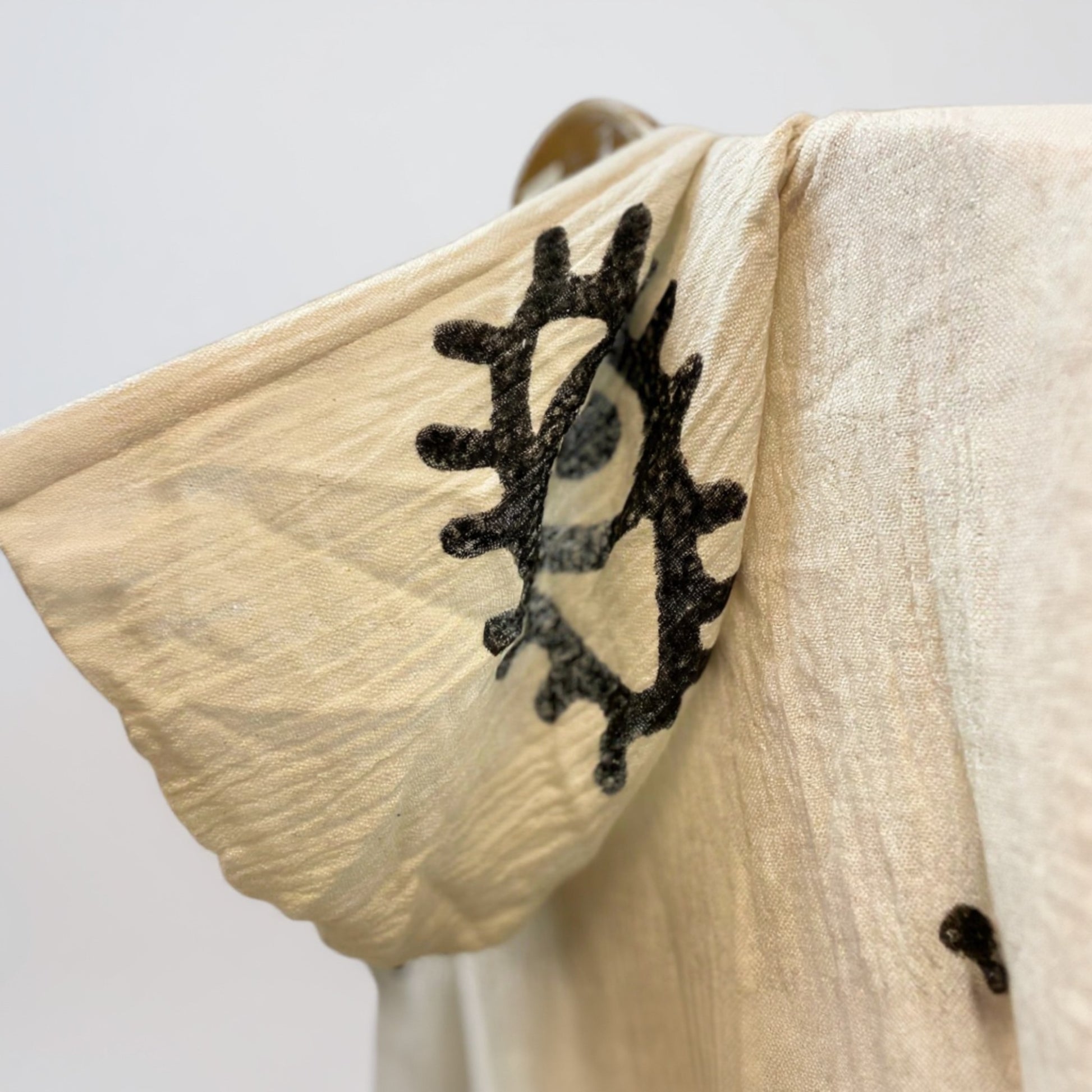 Hood of evil eye surf poncho beachponcho detailed view