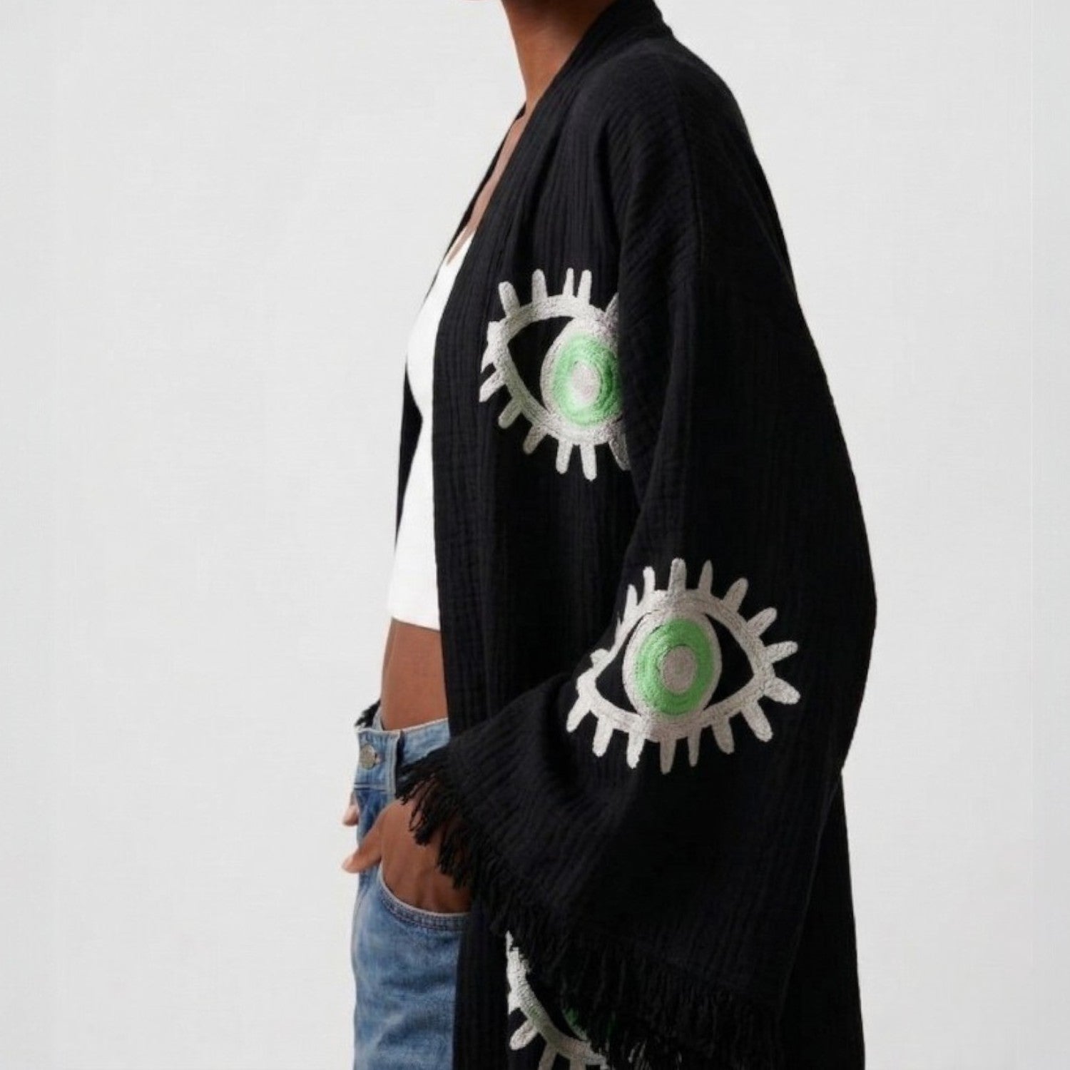 hand woven evil eye turkish cotton kimono robe black on a plain background