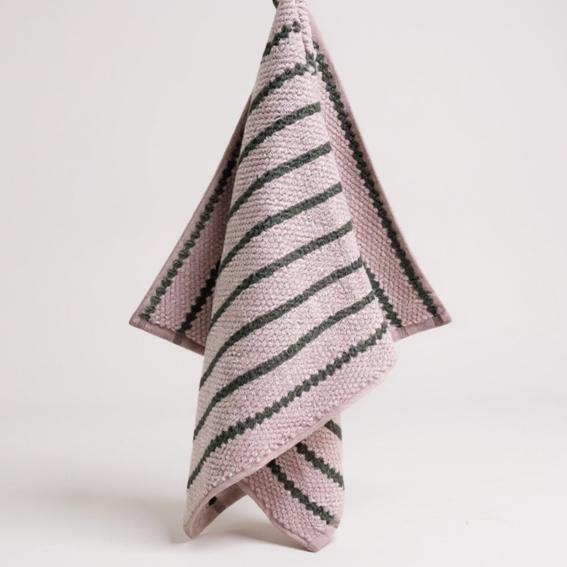 Handmade handwoven natural cotton Turkish hand towels in striped design, shown in four color variations, versatile for hand, head, guest, or kitchen use.