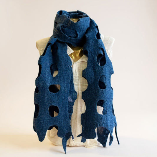 Handmade felted wool shawl/scarf in golden yellow, displayed on a mannequin with cut-out design, soft textured fabric, 35x95 cm