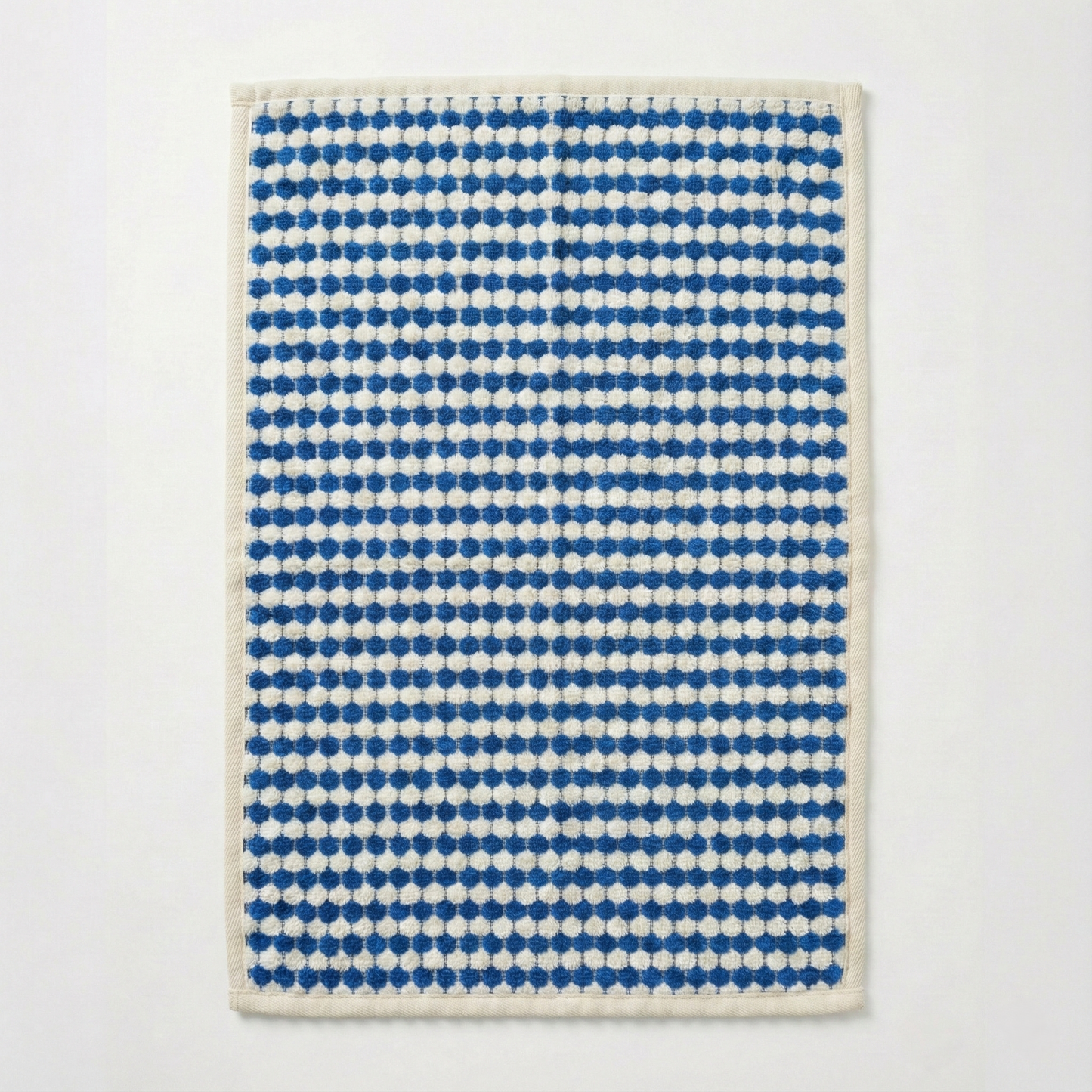 Natural Cotton Turkish Terry Towel Bath Mat – Indigo Dotted on a light gray background