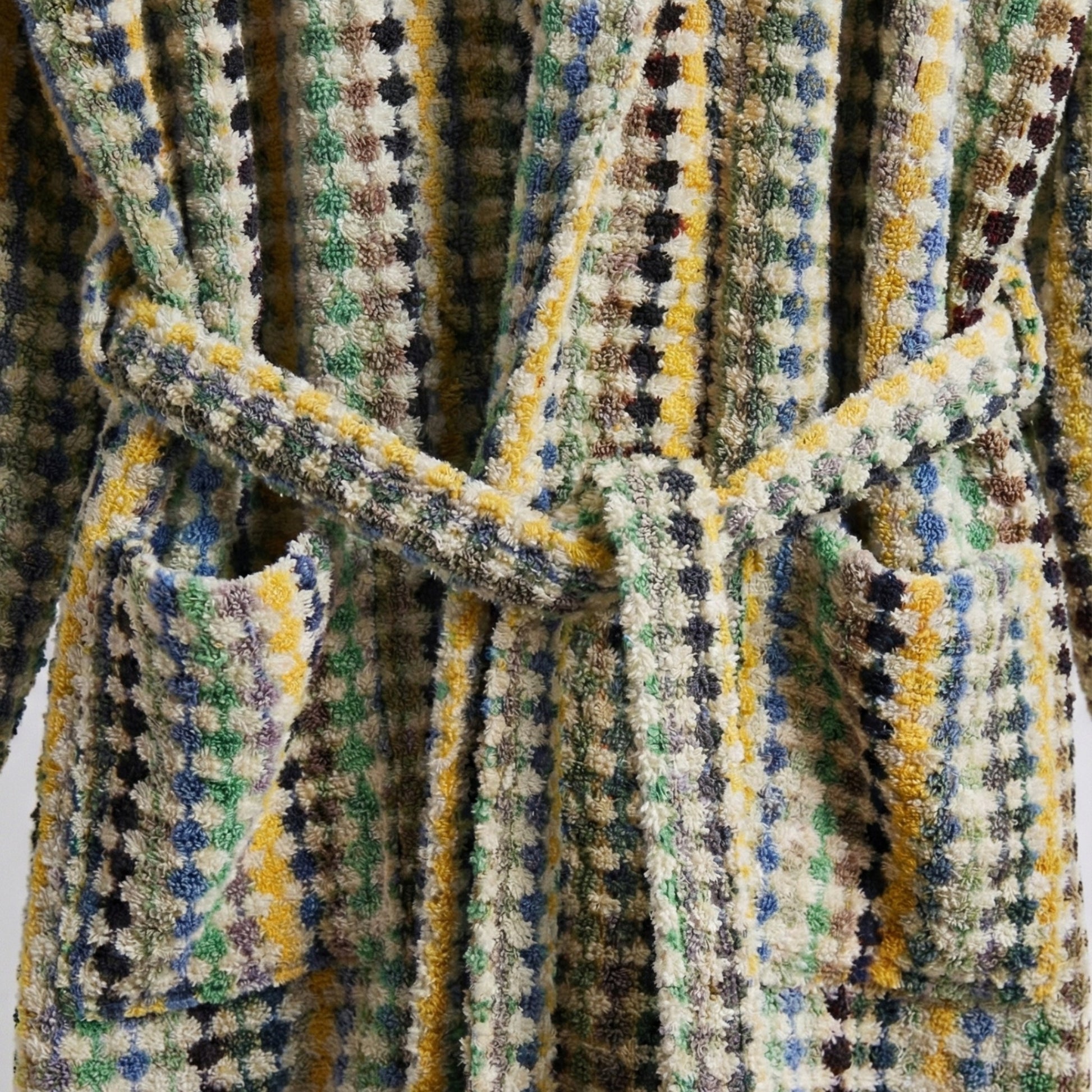 Close-up of a patterned Turkish Terry Bathrobe Hooded, Unisex, Premium Cotton with multicolor design