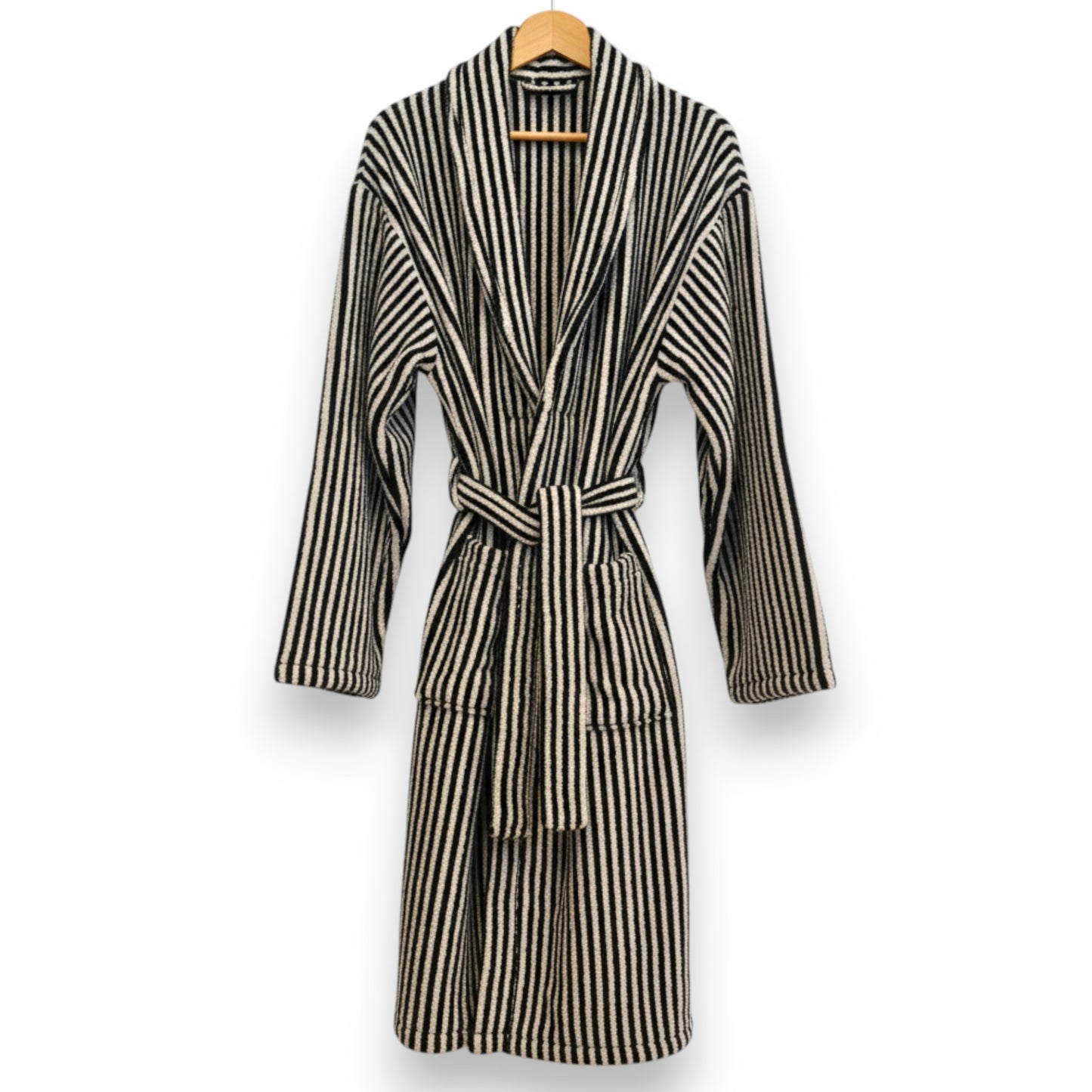 Turkish terry towel unisex bathrobe in black and white stripe design with a shawl collar, made from natural cotton for comfort and absorbency.