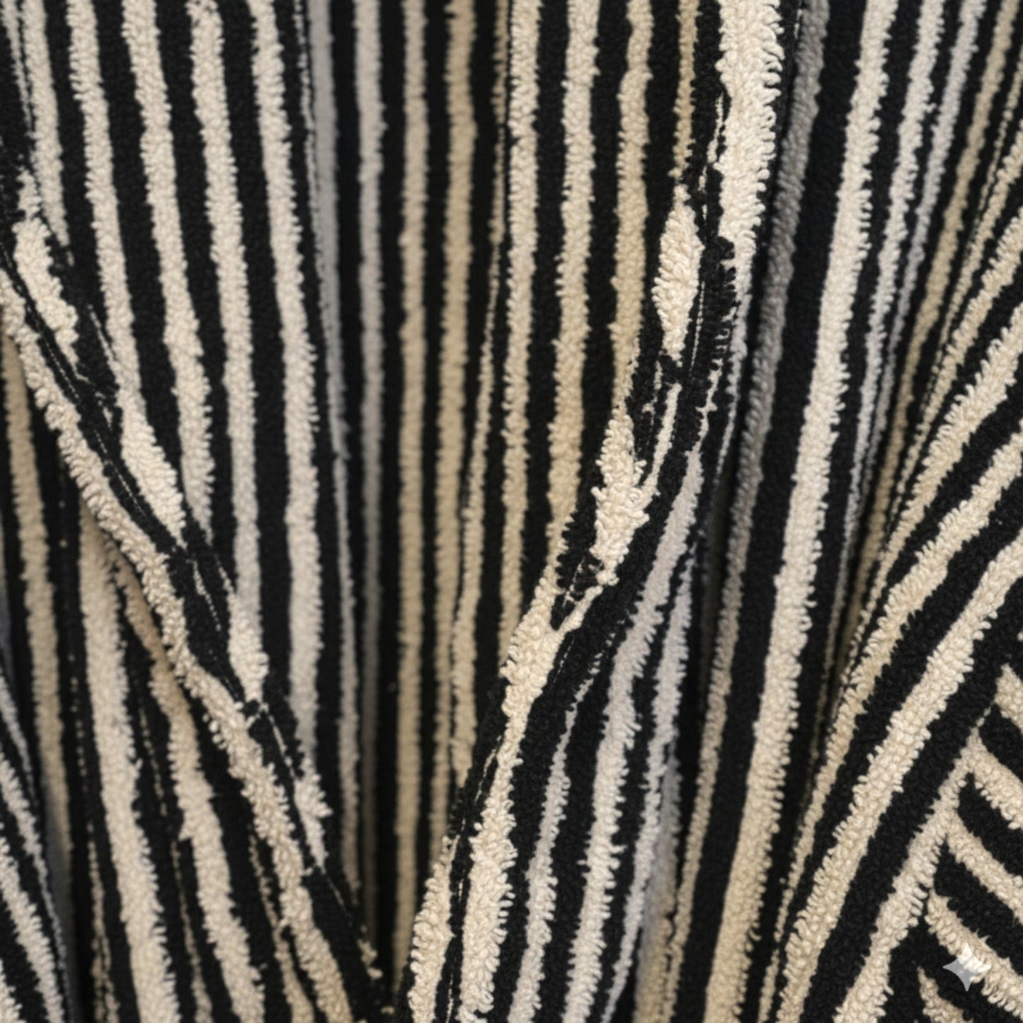 Turkish terry towel unisex bathrobe in black and white stripe design with a shawl collar, made from natural cotton for comfort and absorbency.