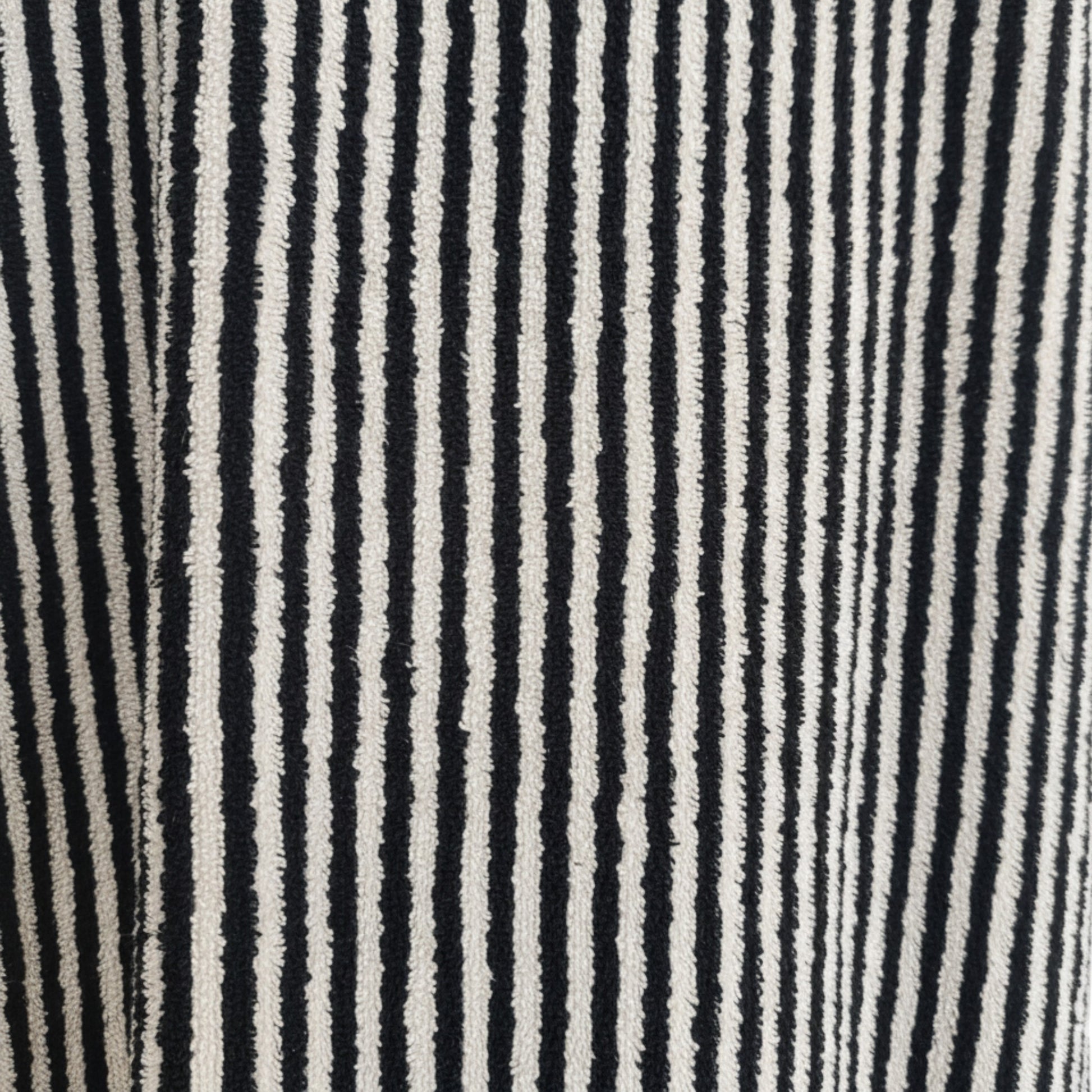 Turkish terry towel unisex bathrobe in black and white stripe design with a shawl collar, made from natural cotton for comfort and absorbency.